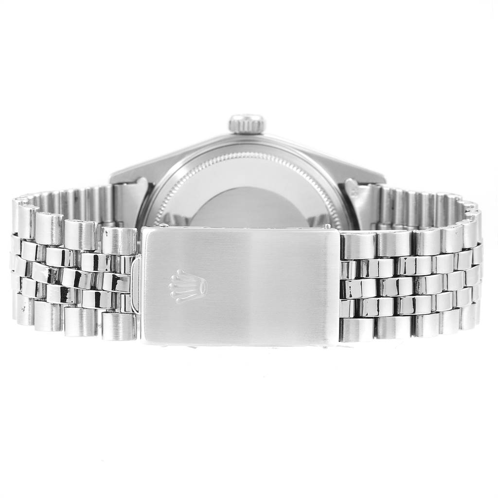 This image shows the back of the case and the bracelet of a Vintage Collection model by Rolex from a straight-on angle.