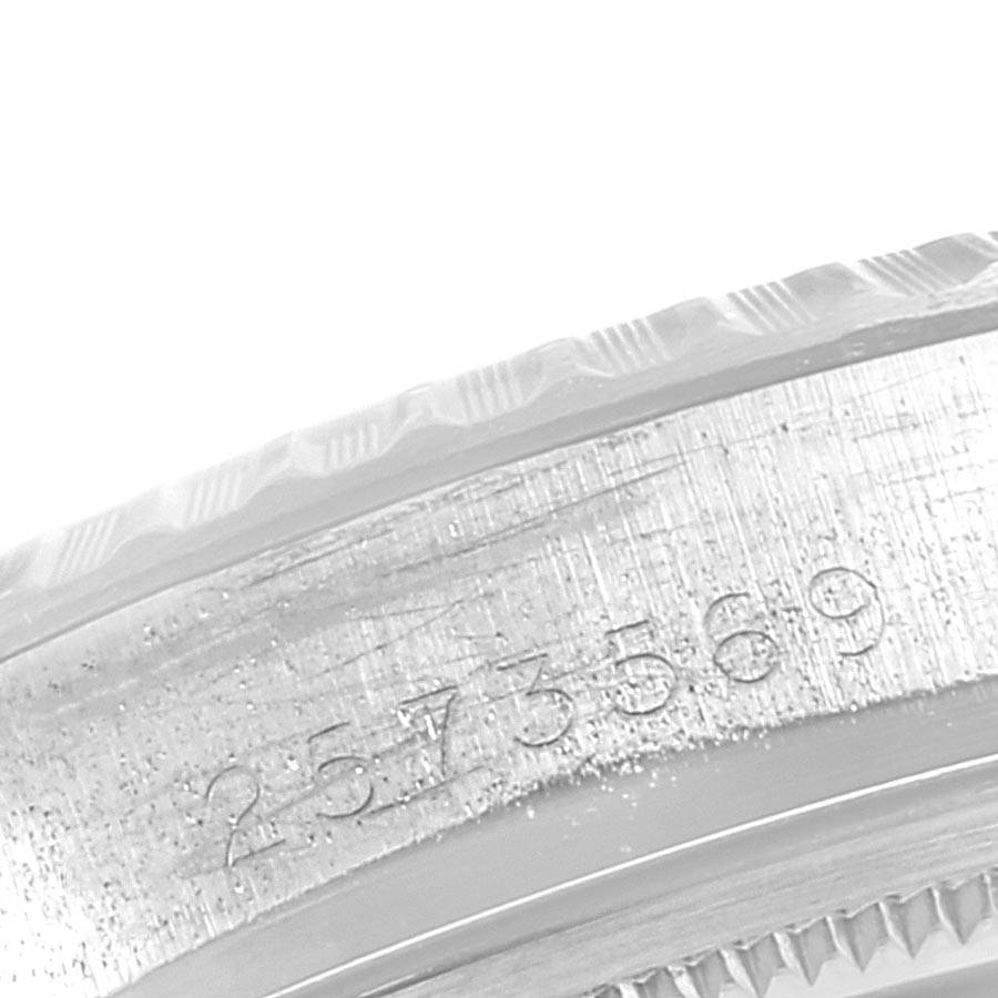 This Rolex Vintage Collection 1603 Men's Stainless Steel Silver Dial 1603 Men's Stainless Steel Silver Dial watch image shows a close-up of its engraved serial number on the case.
