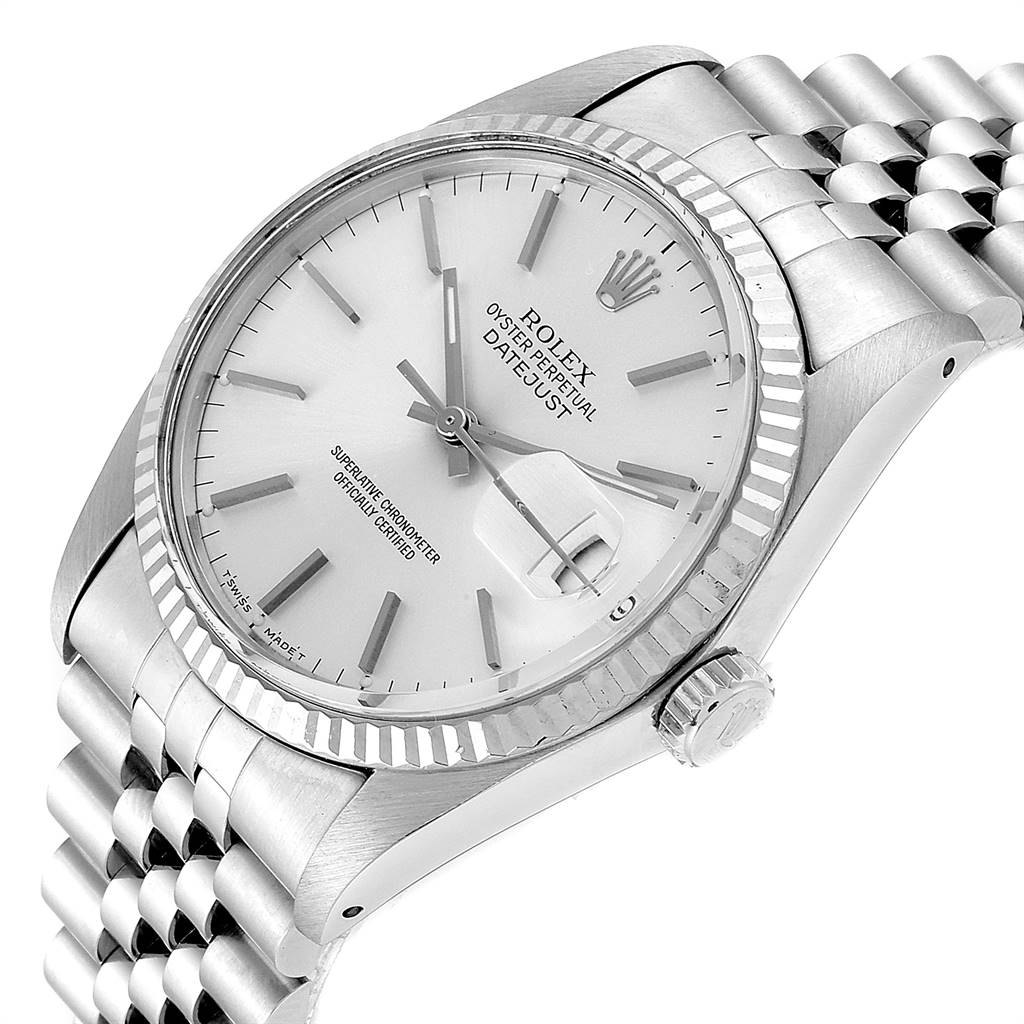 The image shows a Rolex Vintage Collection 16014 Men's Stainless Steel Silver Dial 16014 Men's Stainless Steel Silver Dial watch from an angled side view, showcasing the face, bezel, crown, and part of the bracelet.