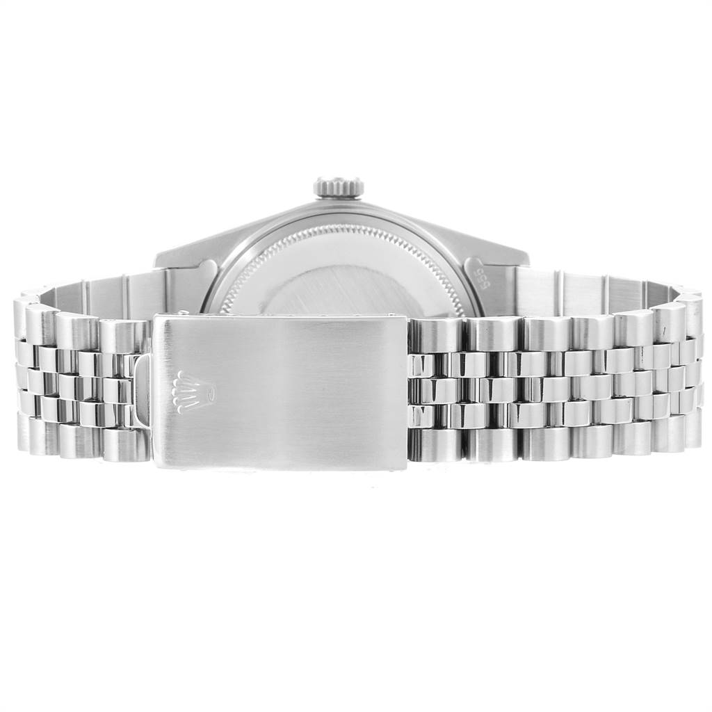 The image shows the back view of the Rolex Vintage Collection 16014 Men's Stainless Steel Silver Dial 16014 Men's Stainless Steel Silver Dial watch, displaying its clasp, bracelet, and case back.