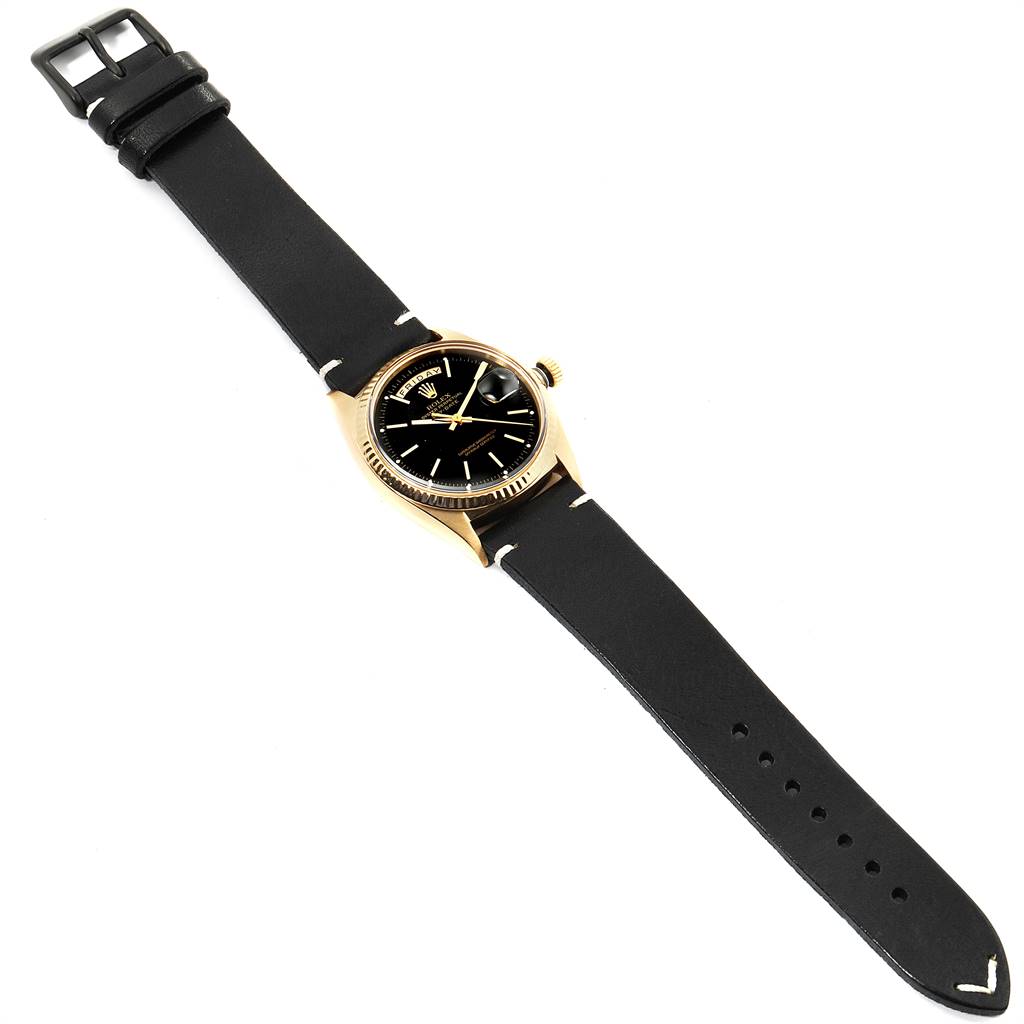 The image shows a Vintage Collection Rolex watch at a slight diagonal angle, displaying the face, case, crown, and leather strap.