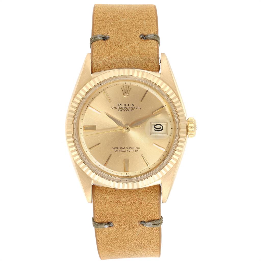 The watch shown is a Rolex Vintage Collection 1601 Men's Yellow Gold Champagne Dial 1601 Men's Yellow Gold Champagne Dial model, displaying a gold dial with a date window, and a beige leather strap.