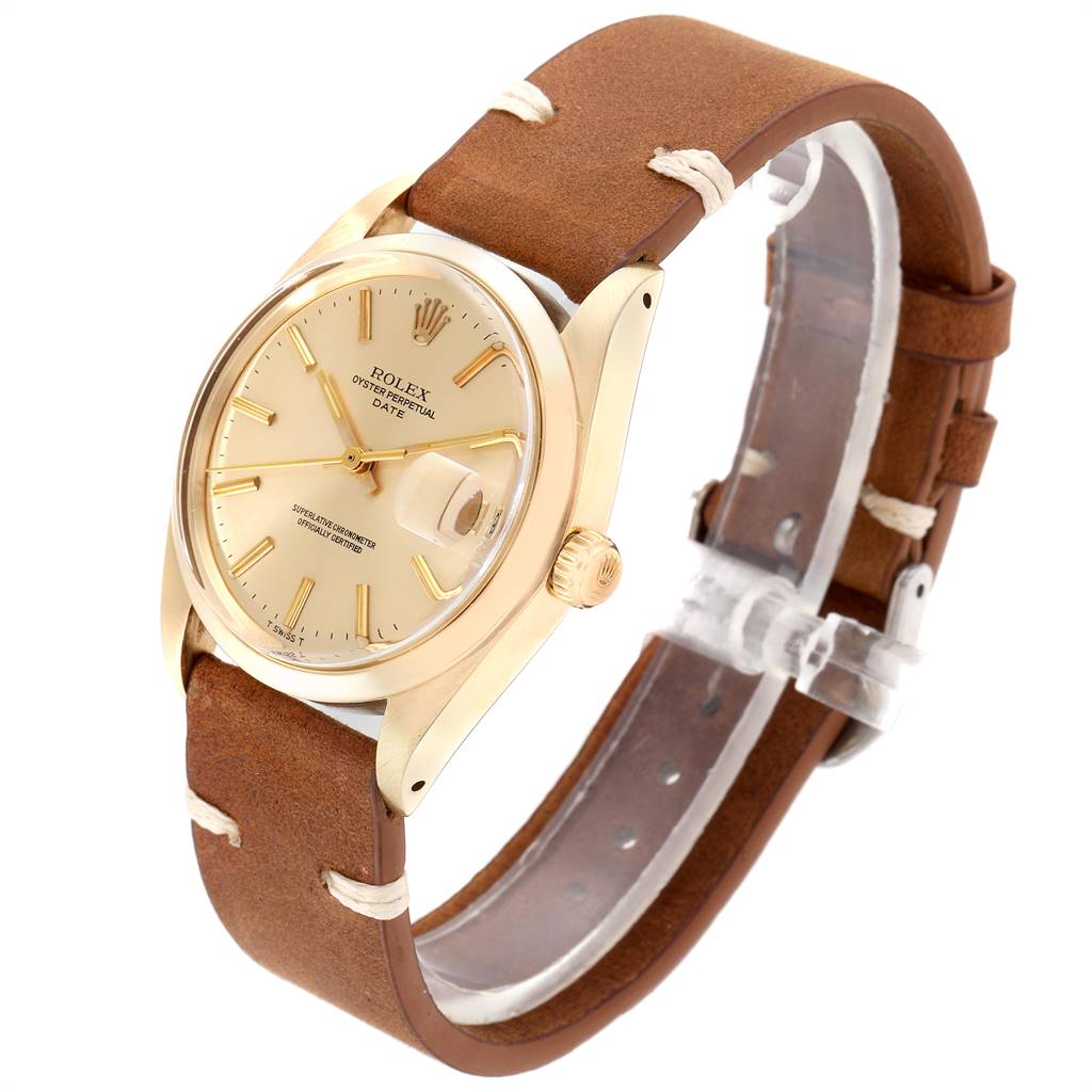 The Rolex Vintage Collection 1500 Men's Yellow Gold Champagne Dial 1500 Men's Yellow Gold Champagne Dial model is shown at a slight angle featuring the dial, case, crown, and leather strap.