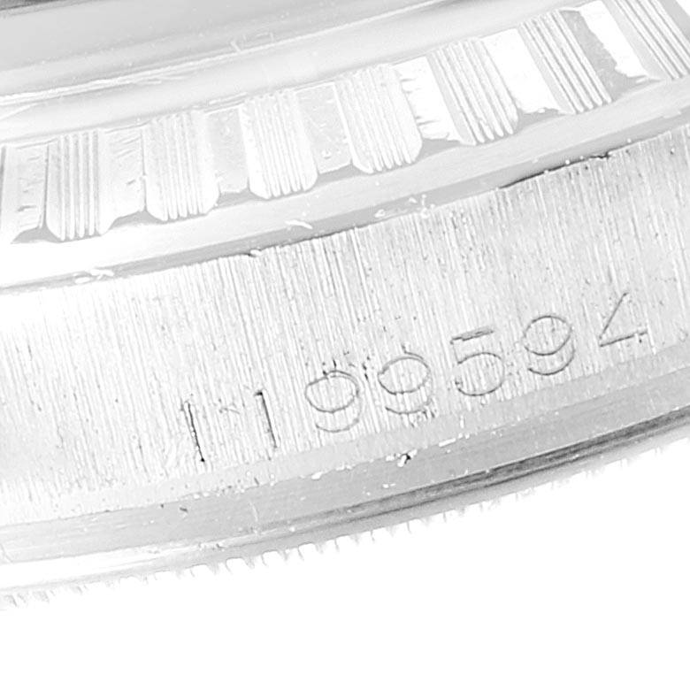 The image shows a close-up of the engraved serial number on the case of a Rolex Vintage Collection 1603 Men
s Stainless Steel Black Dial 1603 Men
s Stainless Steel Black Dial watch.