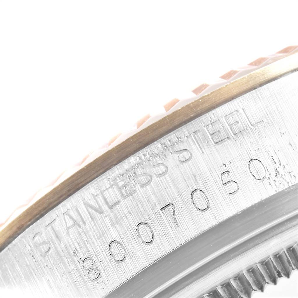 This image shows a close-up of the side case with engraved details of the Rolex Vintage Collection 16013 Men's Stainless Steel Champagne Dial 16013 Men's Stainless Steel Champagne Dial watch.