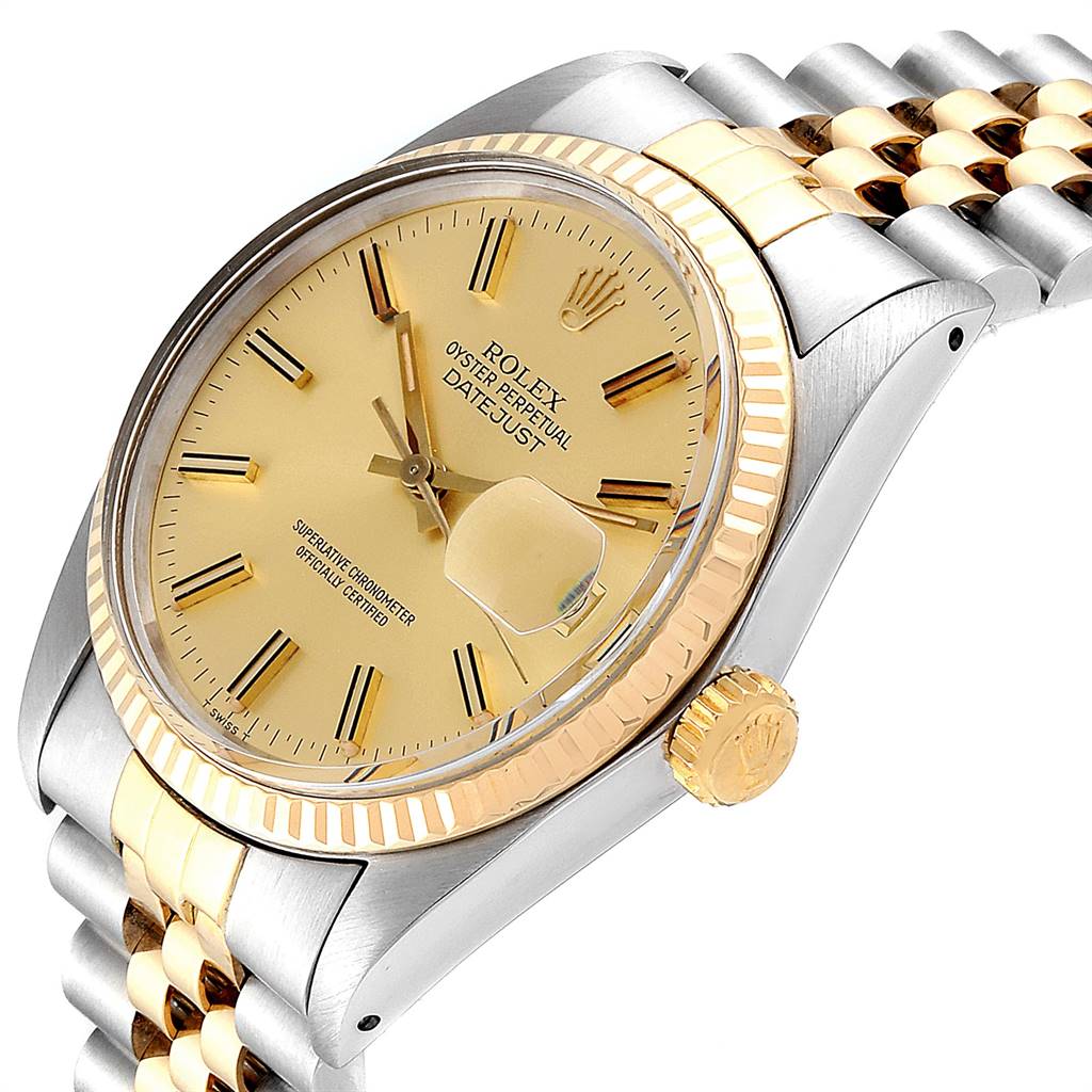 The image shows a side angle view of the Rolex Vintage Collection 16013 Men's Stainless Steel Champagne Dial 16013 Men's Stainless Steel Champagne Dial Datejust, highlighting the gold dial, crown, and two-tone bracelet.