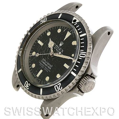 The image shows a slightly angled view of a Vintage Collection Rolex watch, highlighting the dial, bezel, and crown.