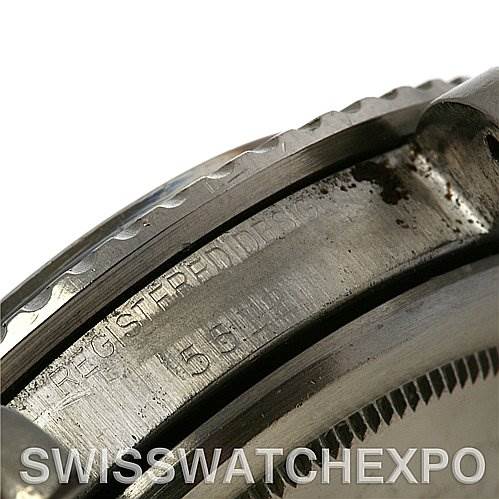 The image shows a close-up of the Rolex Vintage Collection 1512 Men's Stainless Steel Black Dial 1512 Men's Stainless Steel Black Dial watch, focusing on the side bezel and the engraved serial number.