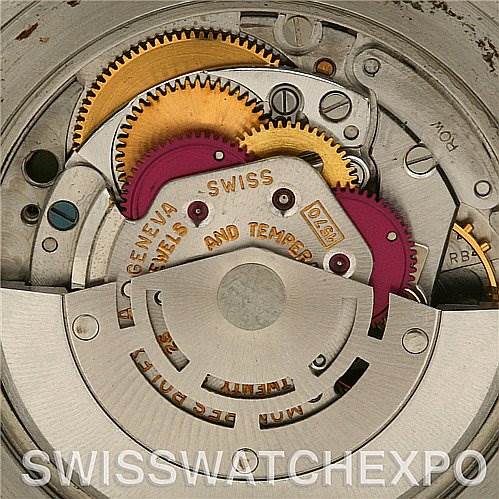 The image shows the intricate inner mechanical movement of the Vintage Collection model by Rolex, highlighting gears and various components.