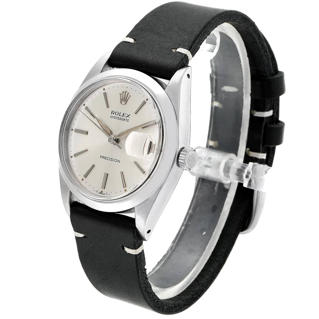The Rolex Vintage Collection 6694 Men
s Stainless Steel Silver Dial 6694 Men
s Stainless Steel Silver Dial watch is shown at an angle displaying the face, bezel, crown, and part of the leather strap.