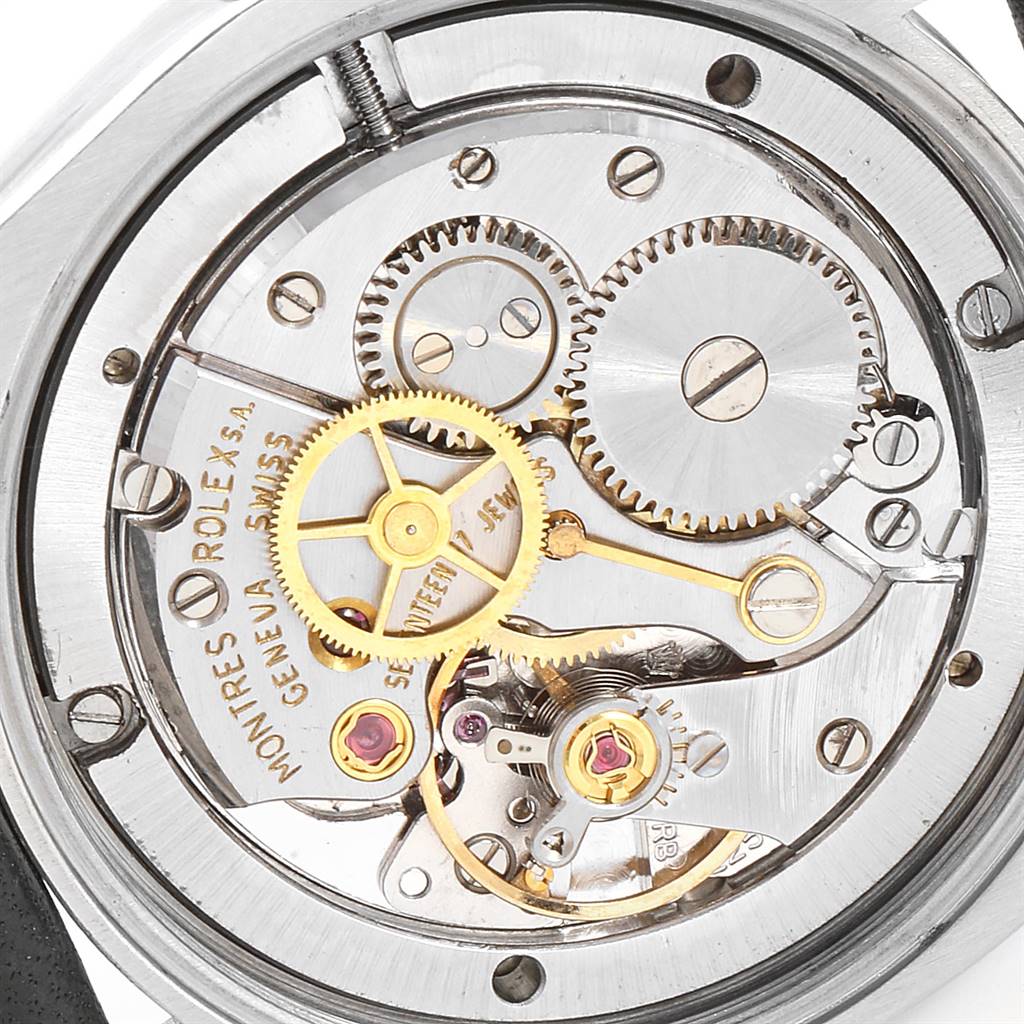 This image shows the intricate internal gears and mechanisms of a Rolex Vintage Collection 6694 Men's Stainless Steel Silver Dial 6694 Men's Stainless Steel Silver Dial watch, viewed from the back.