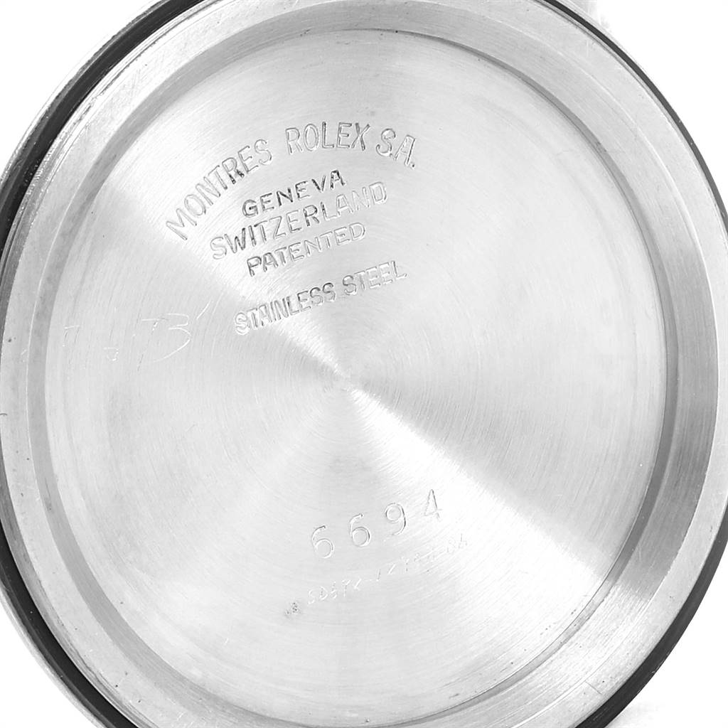 This image shows the inside case back of a Vintage Collection watch by Rolex.