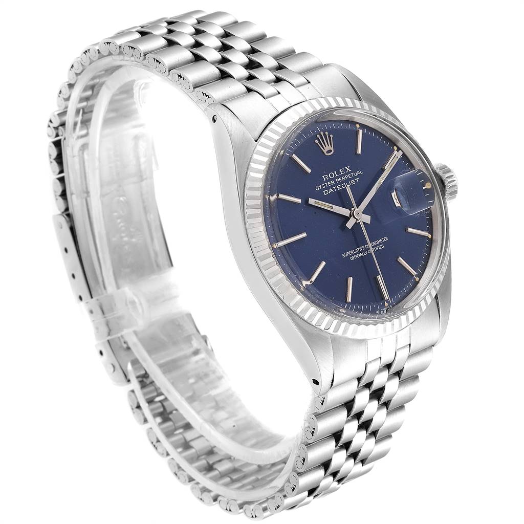 This image shows a Rolex Vintage Collection 1601 Men's Stainless Steel Blue Dial 1601 Men's Stainless Steel Blue Dial Datejust watch from a 3/4 angle, highlighting the face, bracelet, and crown.