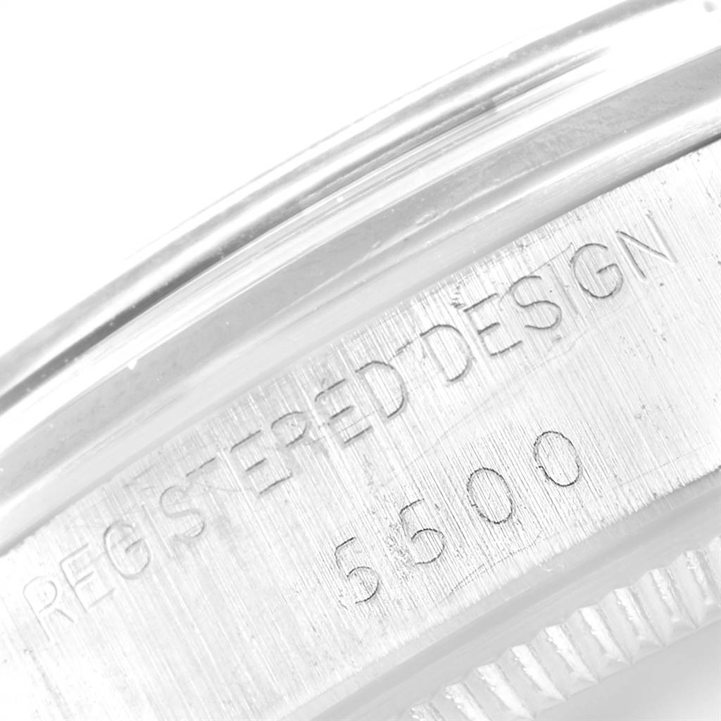 A close-up of the side of a Vintage Collection Rolex watch, showing the case number "5600" and the text "REGISTERED DESIGN."