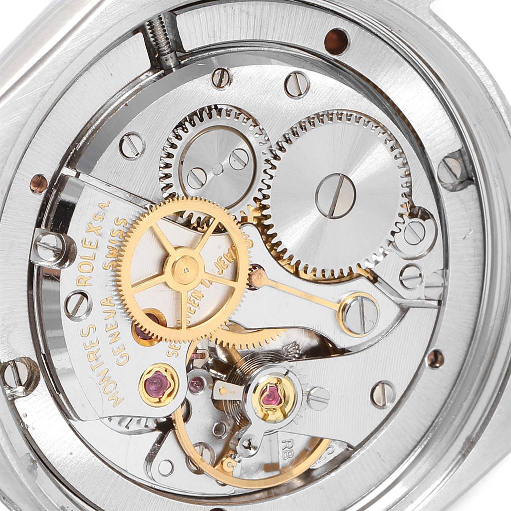 The image shows the intricate internal movement and mechanisms of a Rolex Vintage Collection 6694 Men's Stainless Steel Pink Dial 6694 Men's Stainless Steel Pink Dial watch, viewed from the back.