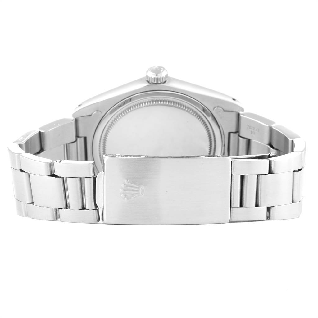 The image shows the back side of a Rolex Vintage Collection 6694 Men's Stainless Steel Pink Dial 6694 Men's Stainless Steel Pink Dial watch, displaying the clasp and bracelet.