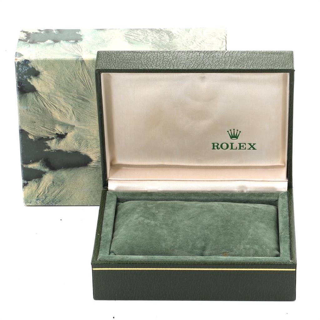 An empty Rolex Vintage Collection 1601 Men's Stainless Steel Grey Dial 1601 Men's Stainless Steel Grey Dial watch box is shown from a front angle, opened to reveal its interior.