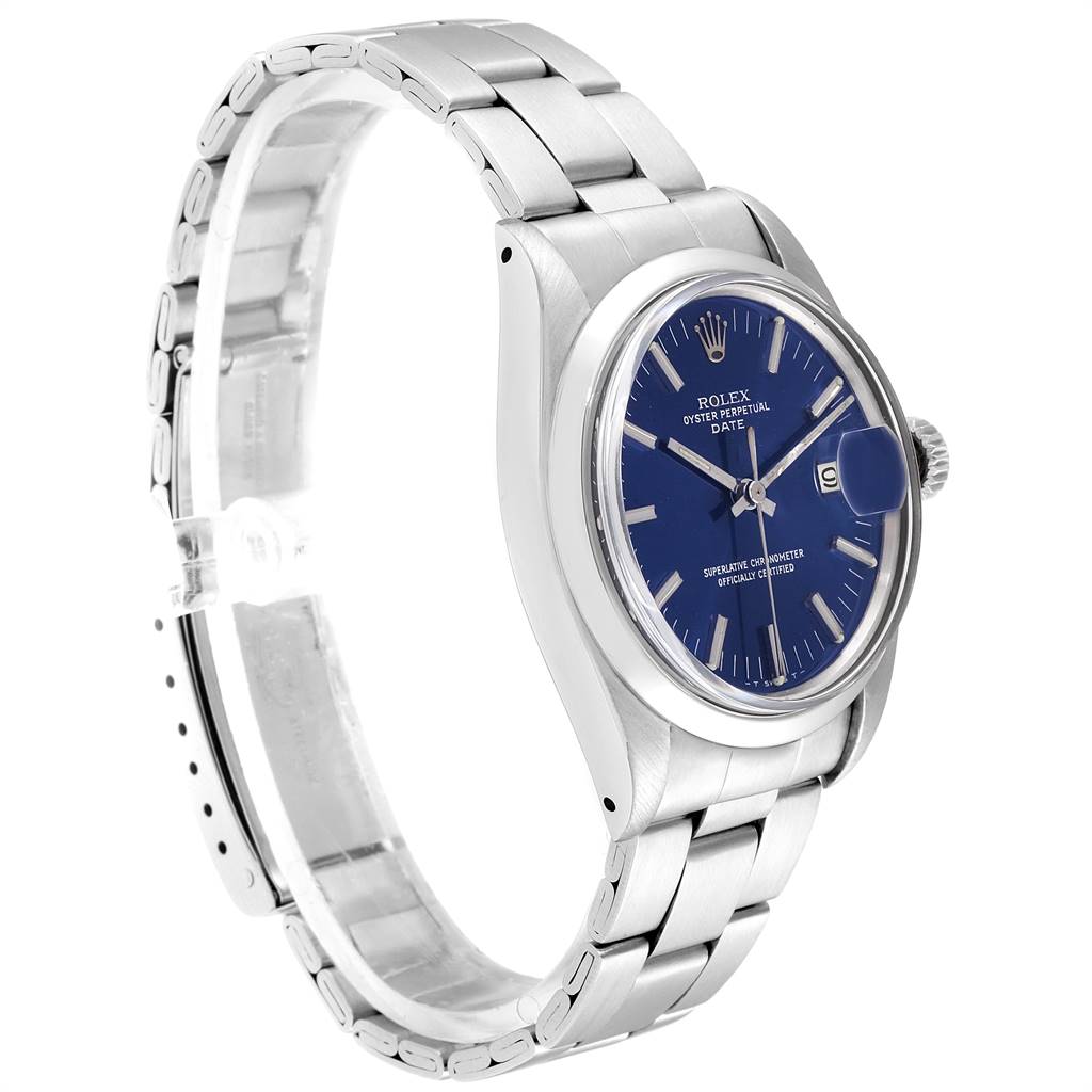 The Vintage Collection Rolex watch is shown at a slight angle, highlighting the blue dial, date, and stainless steel bracelet.