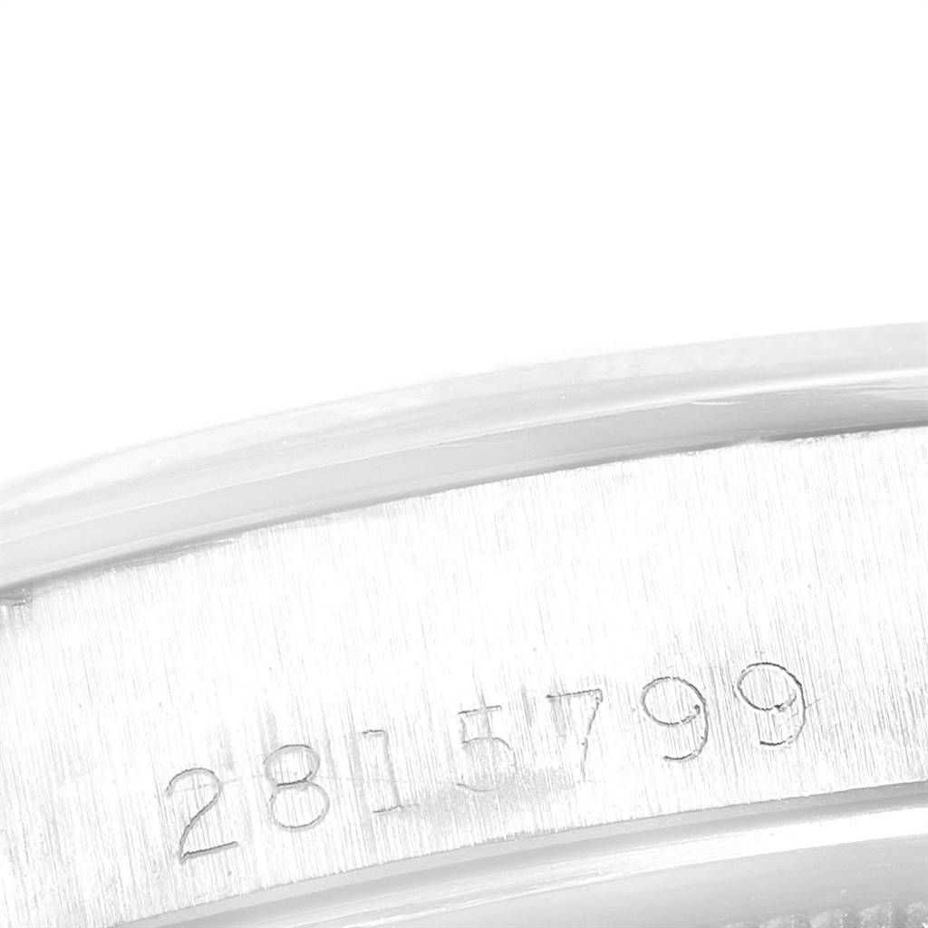 This image shows a close-up angle of the serial number engraving on the case of a Rolex Vintage Collection 1500 Men's Stainless Steel Blue Dial 1500 Men's Stainless Steel Blue Dial watch.