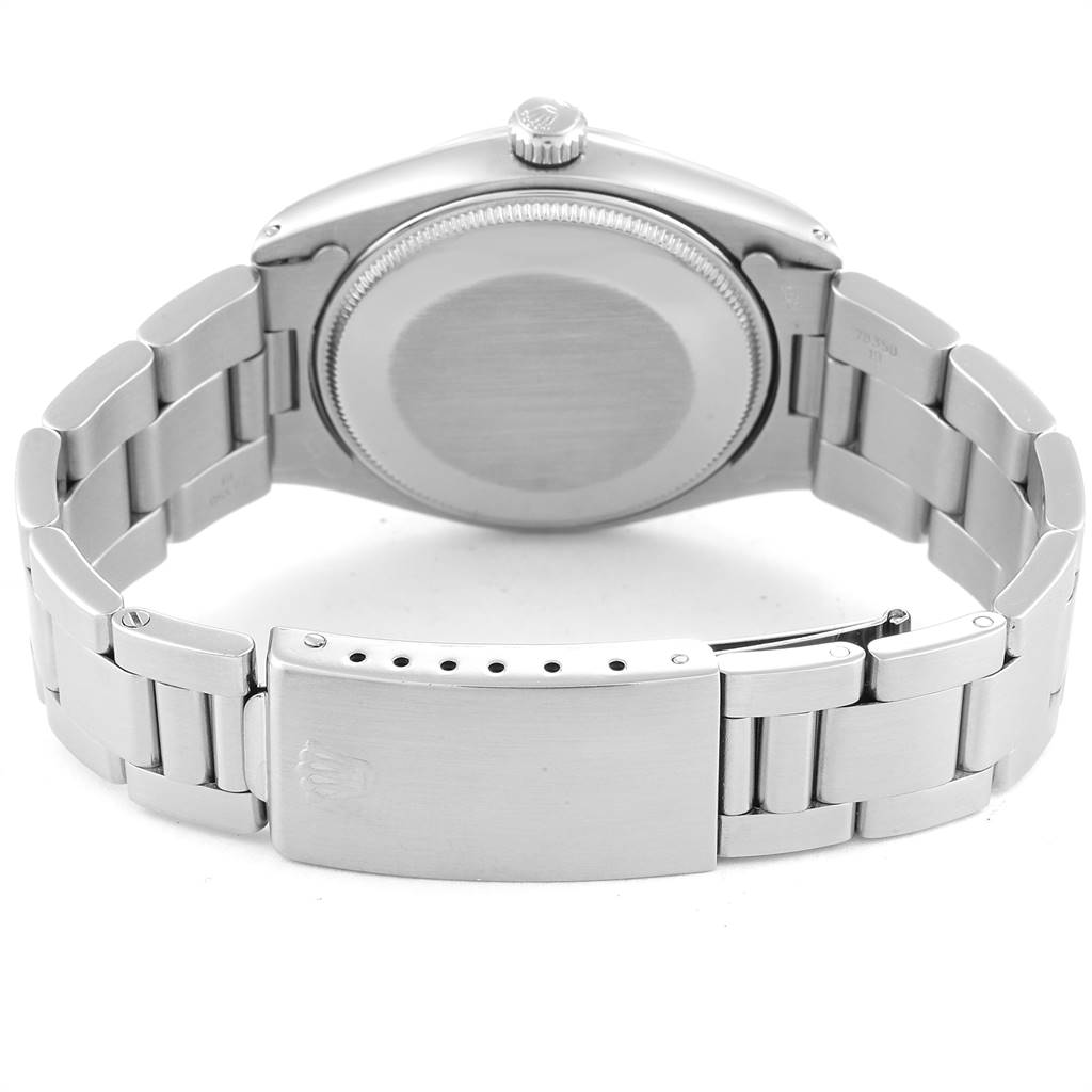 The image shows the back case and bracelet of the Rolex Vintage Collection 1002 Men
s Stainless Steel Silver Dial 1002 Men
s Stainless Steel Silver Dial model from a rear-bottom angle.