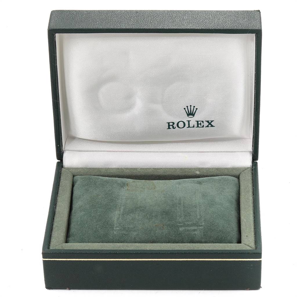 The image shows an open Rolex Vintage Collection 1500 Men
s Stainless Steel Silver Dial 1500 Men
s Stainless Steel Silver Dial watch box, revealing its interior lining and cushion without the watch.