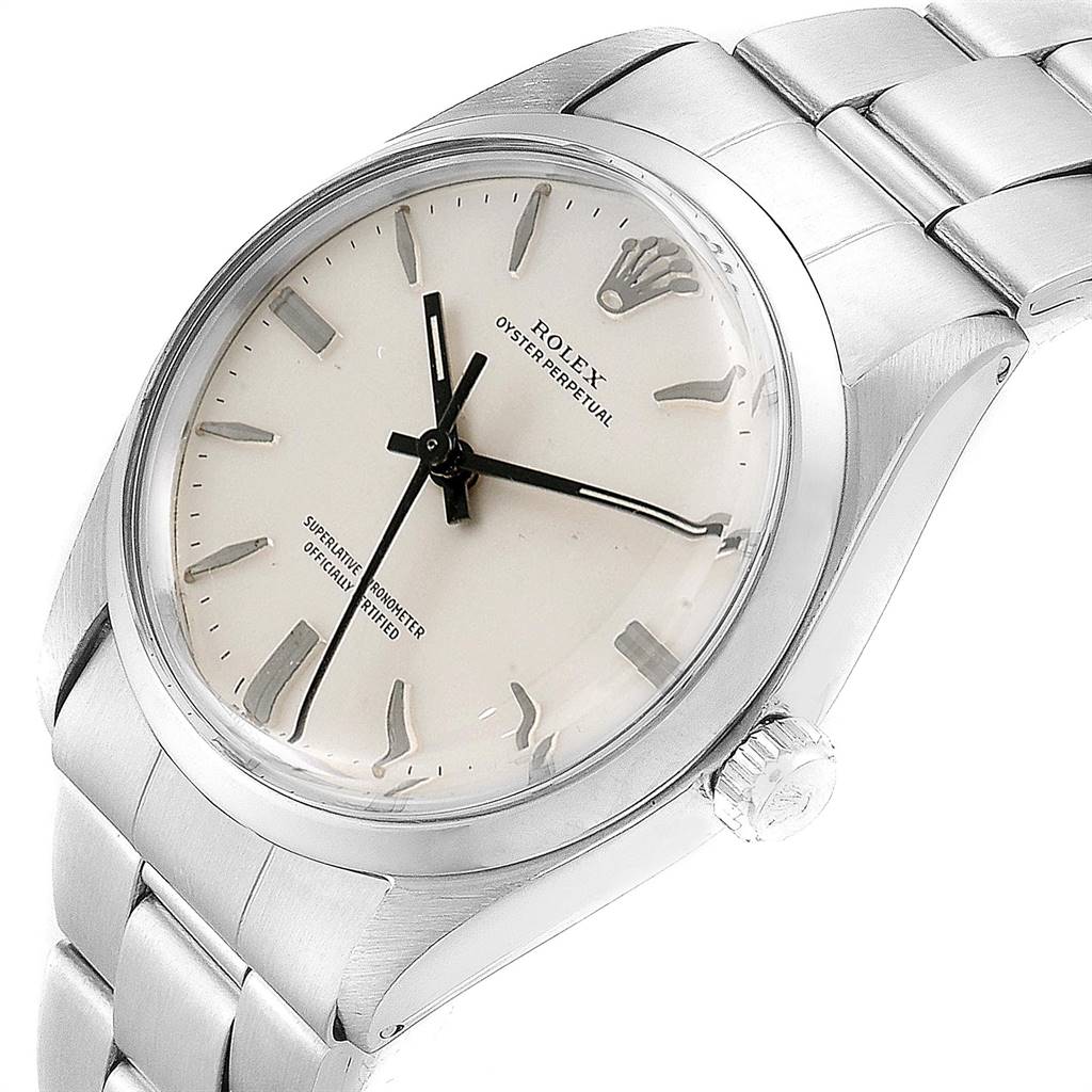 The image shows a Rolex Vintage Collection 1002 Men's Stainless Steel Silver Dial 1002 Men's Stainless Steel Silver Dial watch from an angled view, highlighting the dial, bezel, and part of the bracelet.