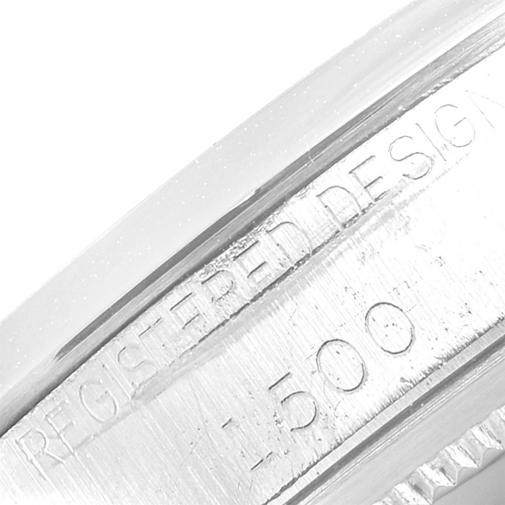 The image shows a close-up of the side casing and engraving of a Rolex Vintage Collection 1500 Men's Stainless Steel Blue Dial 1500 Men's Stainless Steel Blue Dial model with the number 1500 visible.