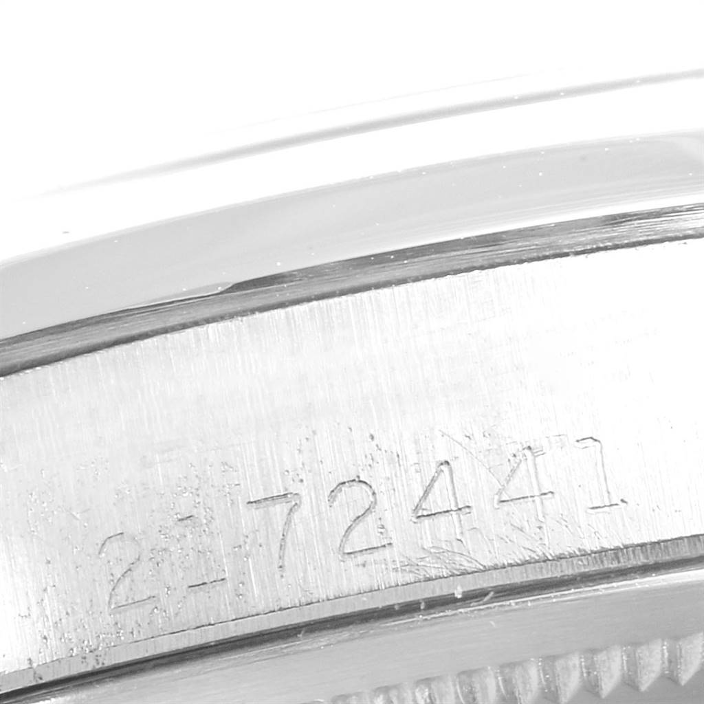 This is a close-up image showing the serial number engraved on the side of the case of a Rolex Vintage Collection 1500 Men's Stainless Steel Blue Dial 1500 Men's Stainless Steel Blue Dial watch.