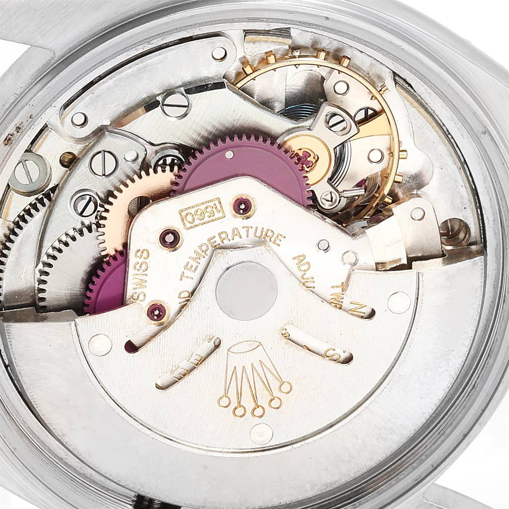 This image shows the intricate internal mechanism of the Rolex Vintage Collection 1601 Men's Steel and Gold (two tone) Silver Dial 1601 Men's Steel and Gold (two tone) Silver Dial watch from a top-down angle.