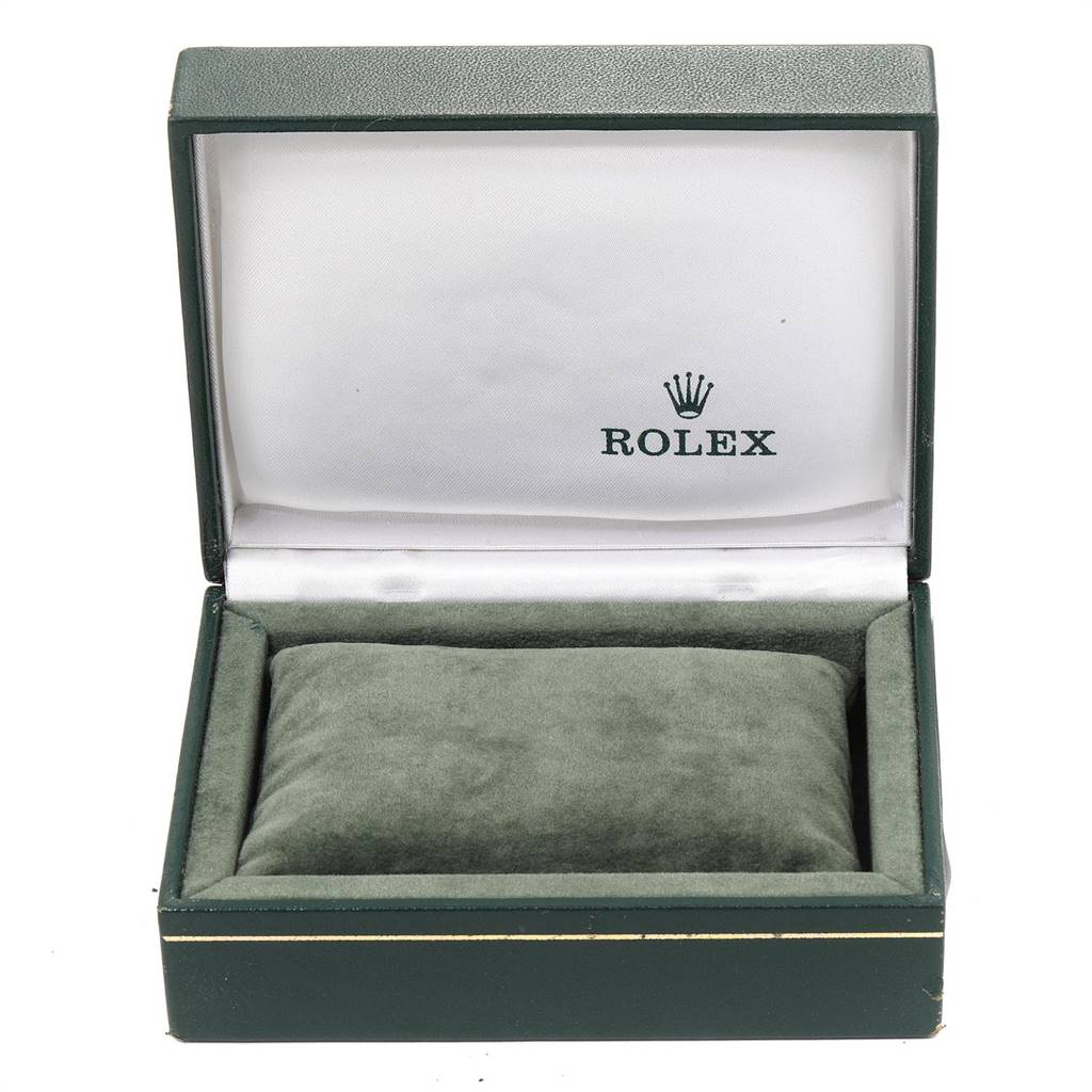 The image shows an open green Rolex watch box for the Vintage Collection model.