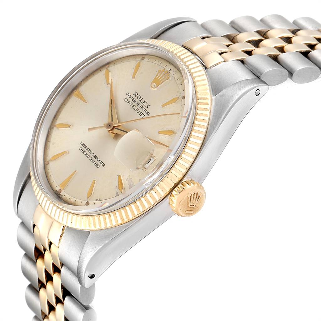 This image shows a side view of a Rolex Vintage Collection 1601 Men's Steel and Gold (two tone) Silver Dial 1601 Men's Steel and Gold (two tone) Silver Dial watch, highlighting the dial, crown, bezel, and part of the bracelet.