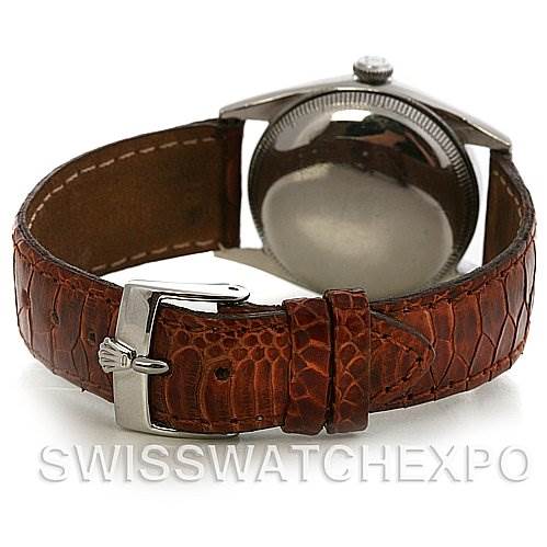 This image shows the back and clasp of a Rolex Vintage Collection 5048 Men's Stainless Steel Silver Dial 5048 Men's Stainless Steel Silver Dial watch with a brown leather strap.