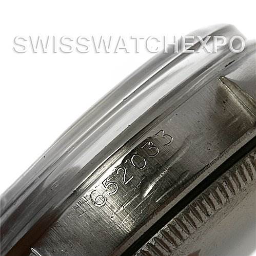 The image shows a close-up of the side of a Rolex Vintage Collection 5048 Men's Stainless Steel Silver Dial 5048 Men's Stainless Steel Silver Dial watch, focusing on its serial number.