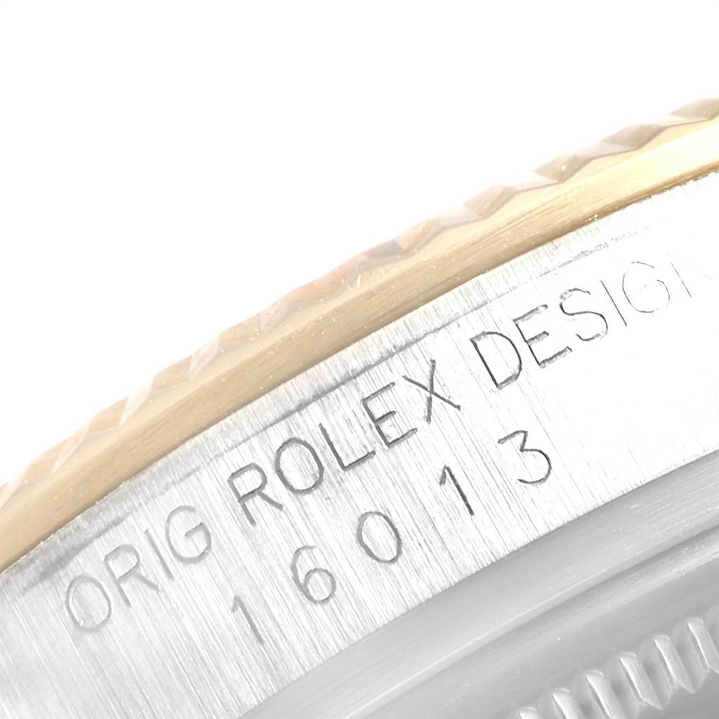 The image shows a close-up of the side of a Rolex Vintage Collection 16013 Men's Stainless Steel White Dial 16013 Men's Stainless Steel White Dial model, highlighting the model number engraving and part of the bezel.
