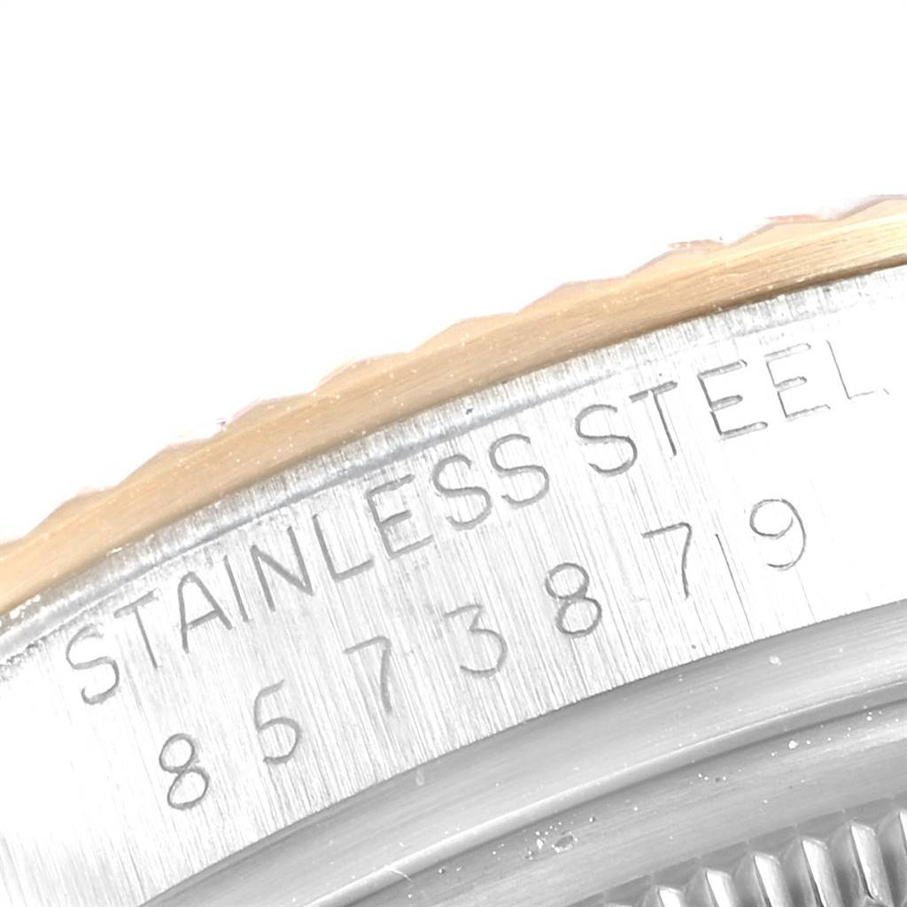 This image shows a close-up of the engraved edge on the stainless steel case of a Rolex Vintage Collection 16013 Men's Stainless Steel White Dial 16013 Men's Stainless Steel White Dial watch.