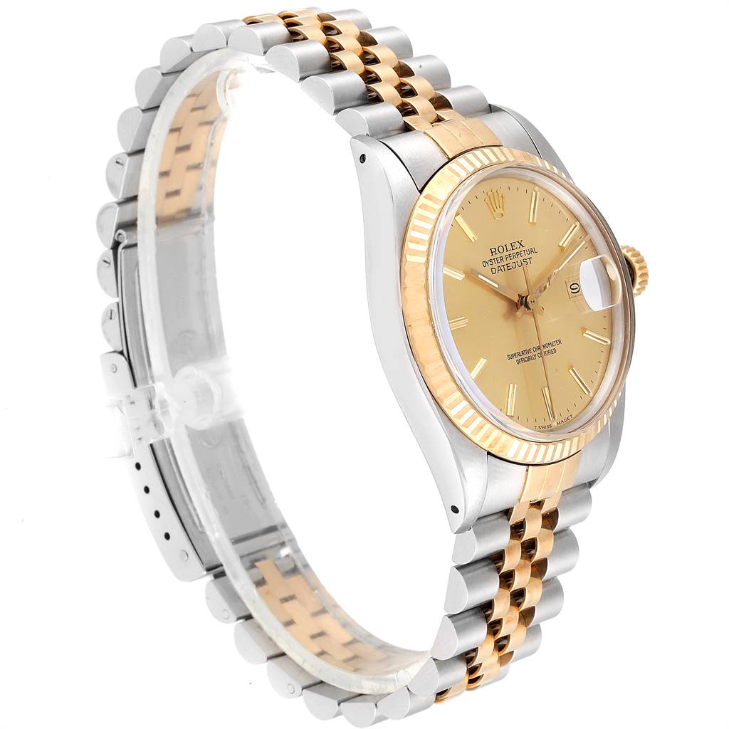 The Rolex Vintage Collection 16013 Men's Stainless Steel Champagne Dial 16013 Men's Stainless Steel Champagne Dial watch is shown at a slight angle, displaying its gold dial, fluted bezel, and two-tone metal bracelet.