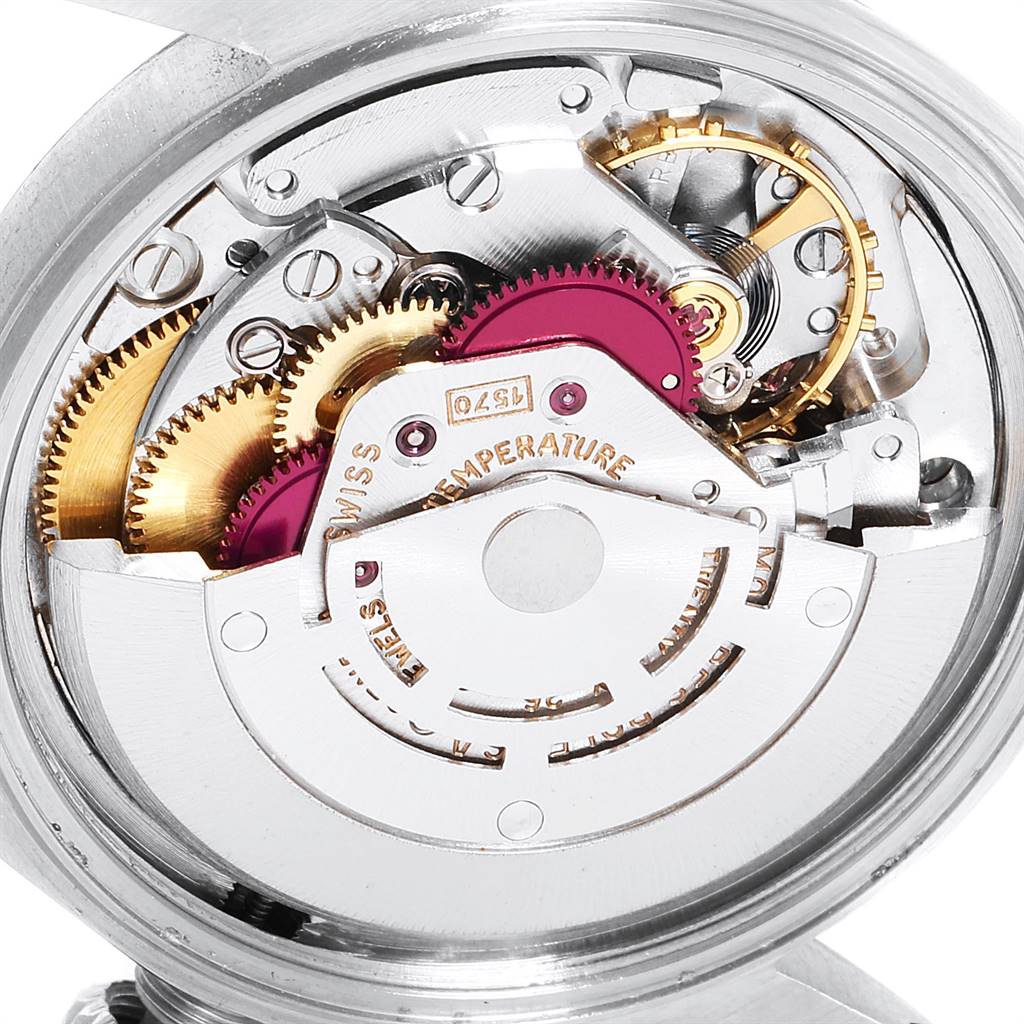 This image shows a close-up view of the vintage movement mechanism inside a Rolex Vintage Collection 1601 Men's Stainless Steel Blue Dial 1601 Men's Stainless Steel Blue Dial model watch.