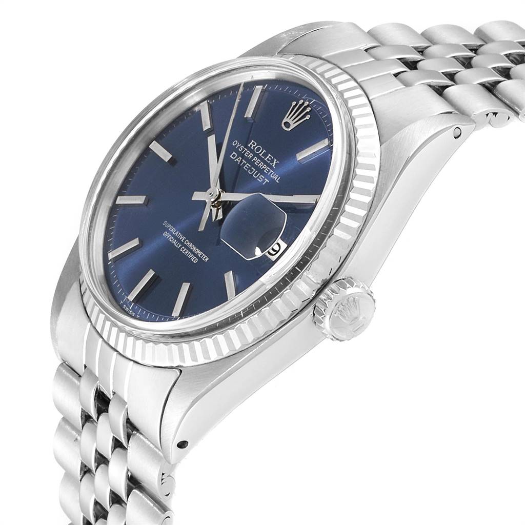 The image shows a side angle of a Rolex Vintage Collection 1601 Men's Stainless Steel Blue Dial 1601 Men's Stainless Steel Blue Dial Oyster Perpetual Datejust watch, highlighting its case, bezel, crown, and band.