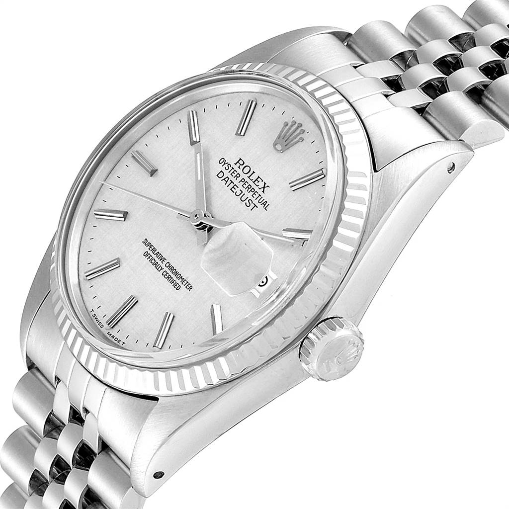 The image shows a close-up angle of the Rolex Vintage Collection 16014 Men
s Stainless Steel Silver Dial 16014 Men
s Stainless Steel Silver Dial Datejust, highlighting the dial, bezel, crown, and bracelet.
