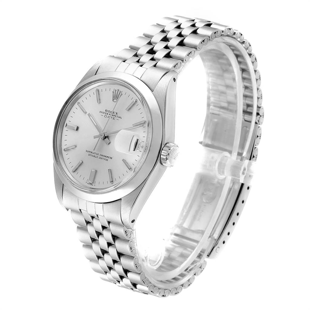 The image shows a side view and partial front view of a Rolex Vintage Collection 1500 Men
s Stainless Steel Silver Dial 1500 Men
s Stainless Steel Silver Dial watch, highlighting the face, crown, and bracelet.