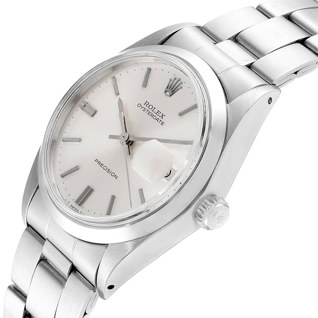 The image shows a side-angle view of a Rolex Vintage Collection 6694 Men
s Stainless Steel Silver Dial 6694 Men
s Stainless Steel Silver Dial watch, highlighting the dial, crown, and part of the bracelet.