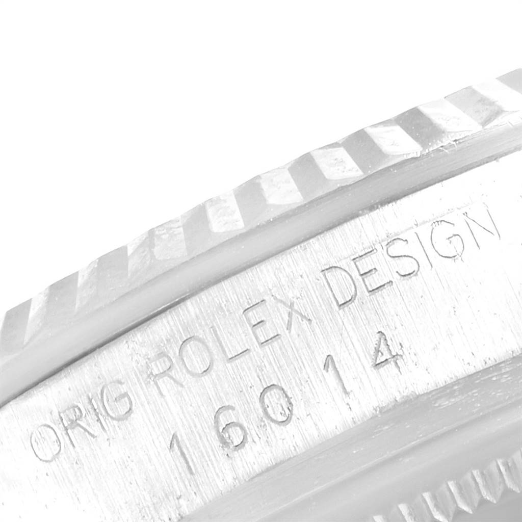 This image shows the side view of the bezel and case with "ORIG ROLEX DESIGN" and model number "16014" engraved on the Vintage Collection Rolex.