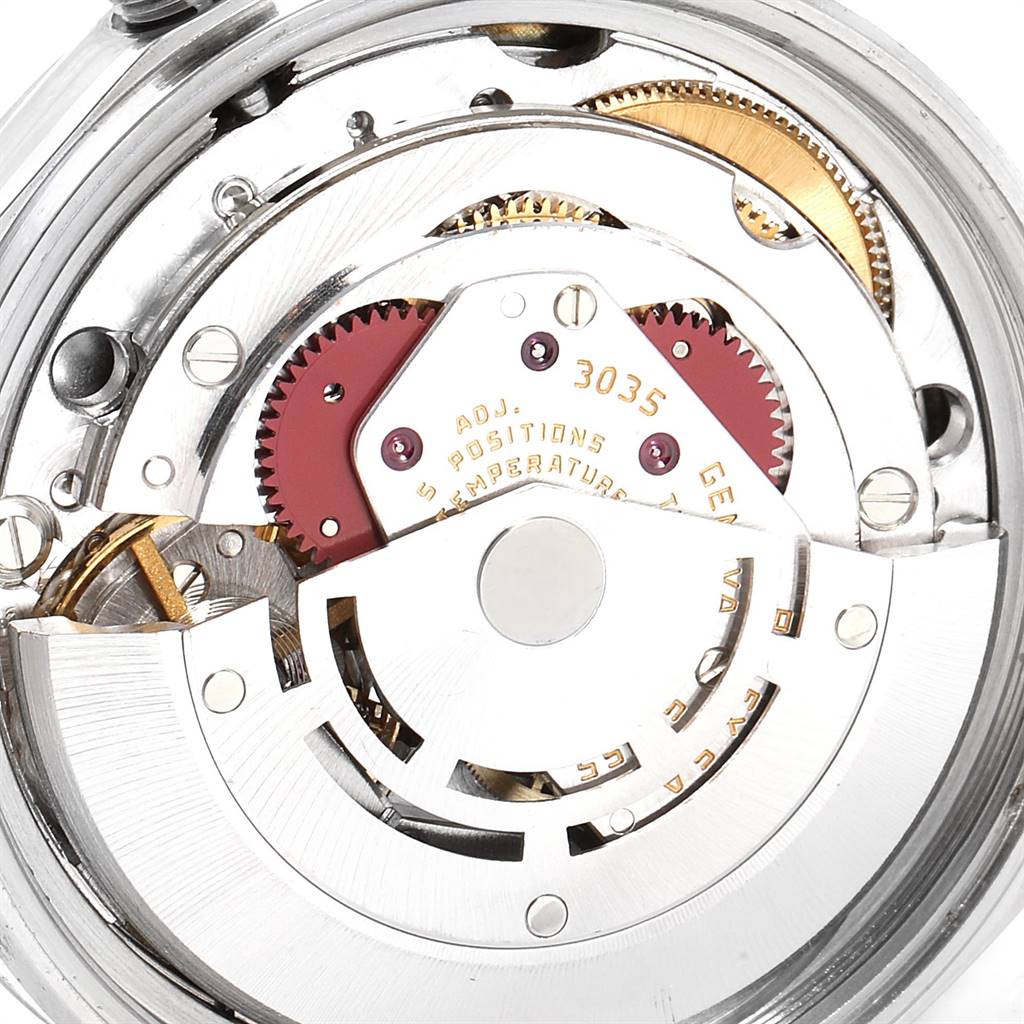 The image shows the internal movement mechanism of a Vintage Collection Rolex watch at a close-up, detailed angle.