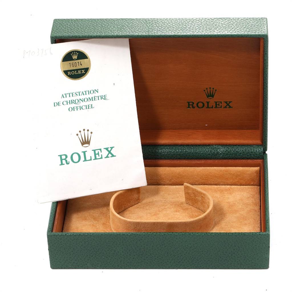 The image shows an open Rolex Vintage Collection 16014 Men
s Stainless Steel Silver Dial 16014 Men
s Stainless Steel Silver Dial watch box with its certificate.