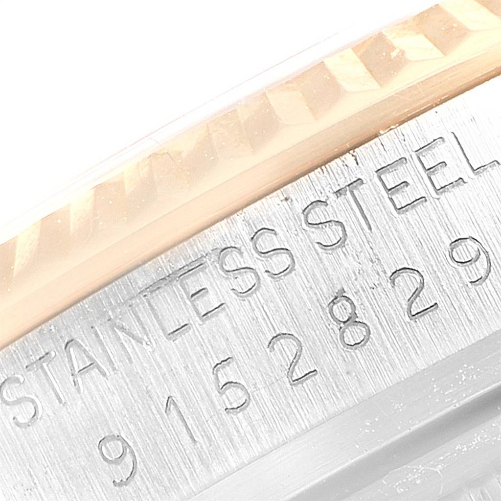 This is a close-up of the serial number and "STAINLESS STEEL" engraving on a Rolex Vintage Collection 16013 Men's Stainless Steel Brown Dial 16013 Men's Stainless Steel Brown Dial watch.