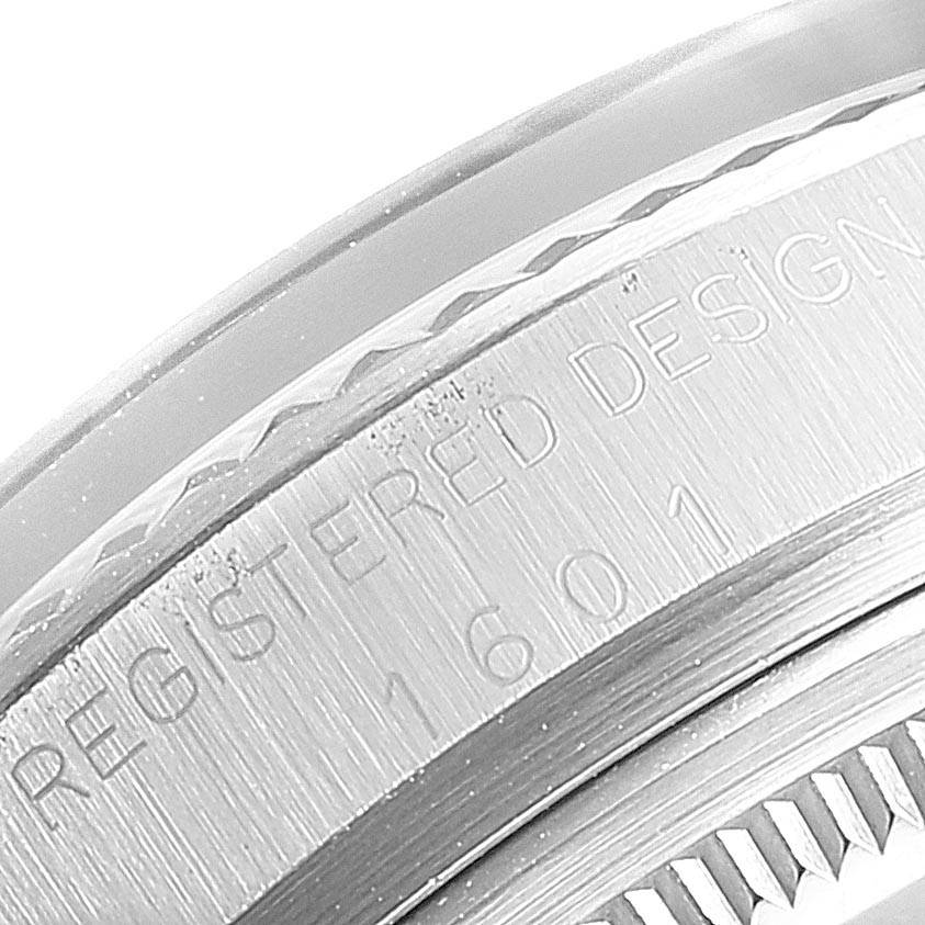 This image shows a close-up angle of the Rolex Vintage Collection 1601 Men
s Stainless Steel Silver Dial 1601 Men
s Stainless Steel Silver Dial model, highlighting the engraved case with reference number 1601.