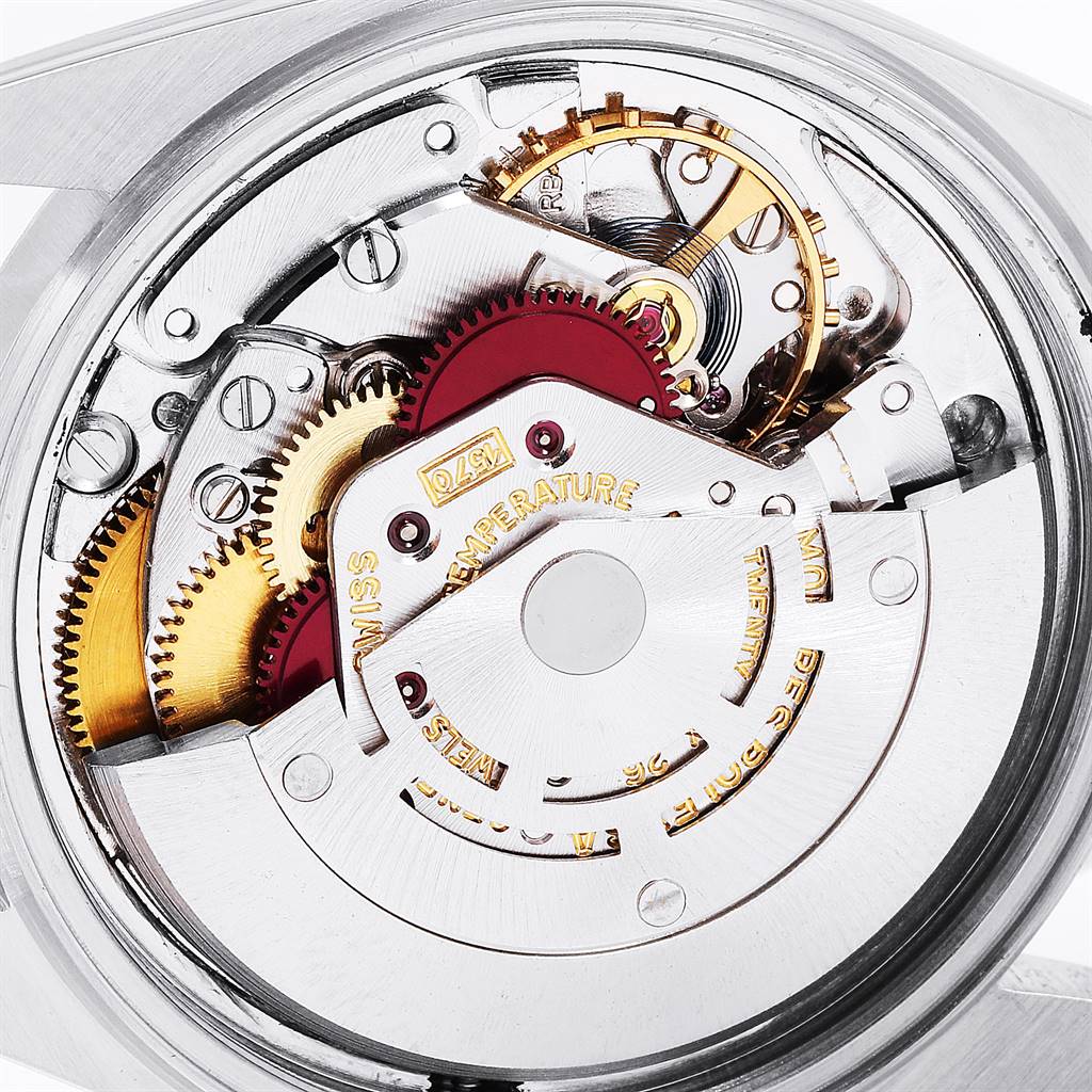 The image shows the intricate internal mechanism of a Vintage Collection model by Rolex, viewed from the back.