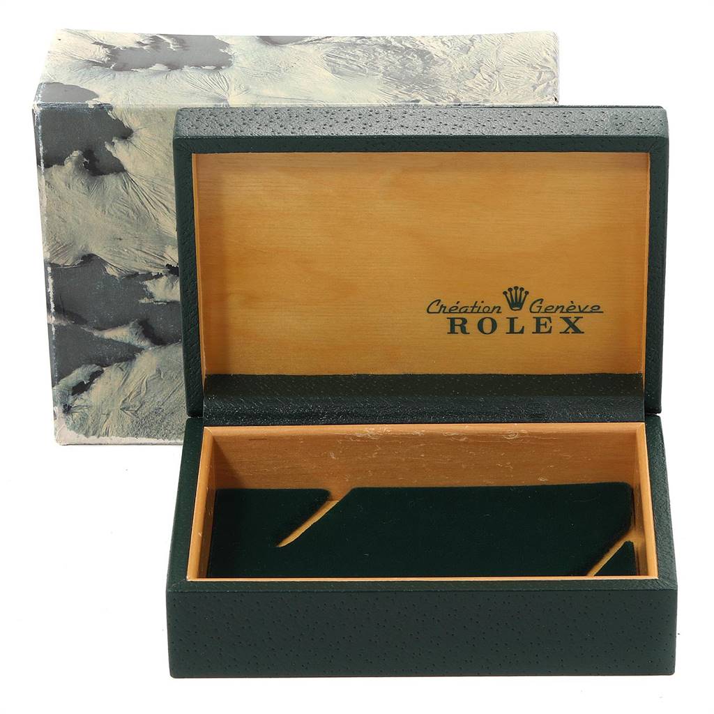 The image shows an open empty box for the Rolex Vintage Collection 1601 Men
s Stainless Steel Silver Dial 1601 Men
s Stainless Steel Silver Dial model, with a wooden interior and branded lid.