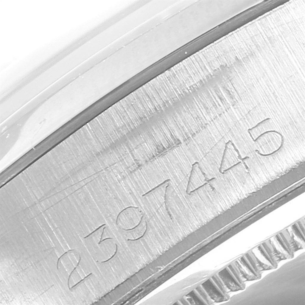 This image shows a close-up of the serial number on the case side of a Vintage Collection model by Rolex.