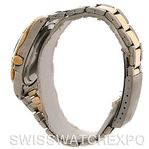 A side view of the Rolex Vintage Collection 1675 Men's Stainless Steel Brown Dial 1675 Men's Stainless Steel Brown Dial model, showing the watch case, crown, and two-tone bracelet.